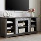 Mantel Stone modern entertainment console, manually stacked stone surrounds open storage space, gray