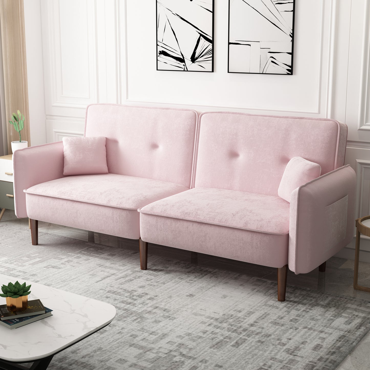 Sofá cama convertible con patas de madera y tapizado de terciopelo en color rosa para salones modernos