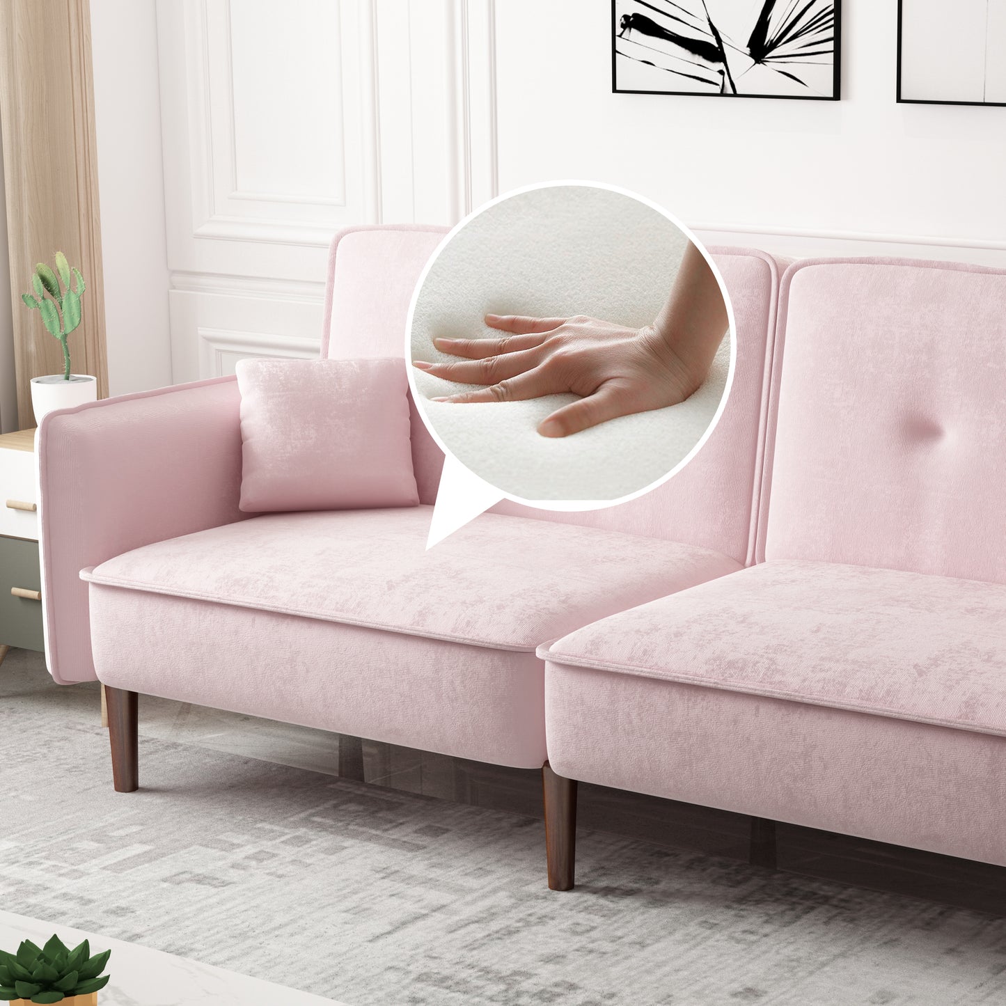 Sofá cama convertible con patas de madera y tapizado de terciopelo en color rosa para salones modernos