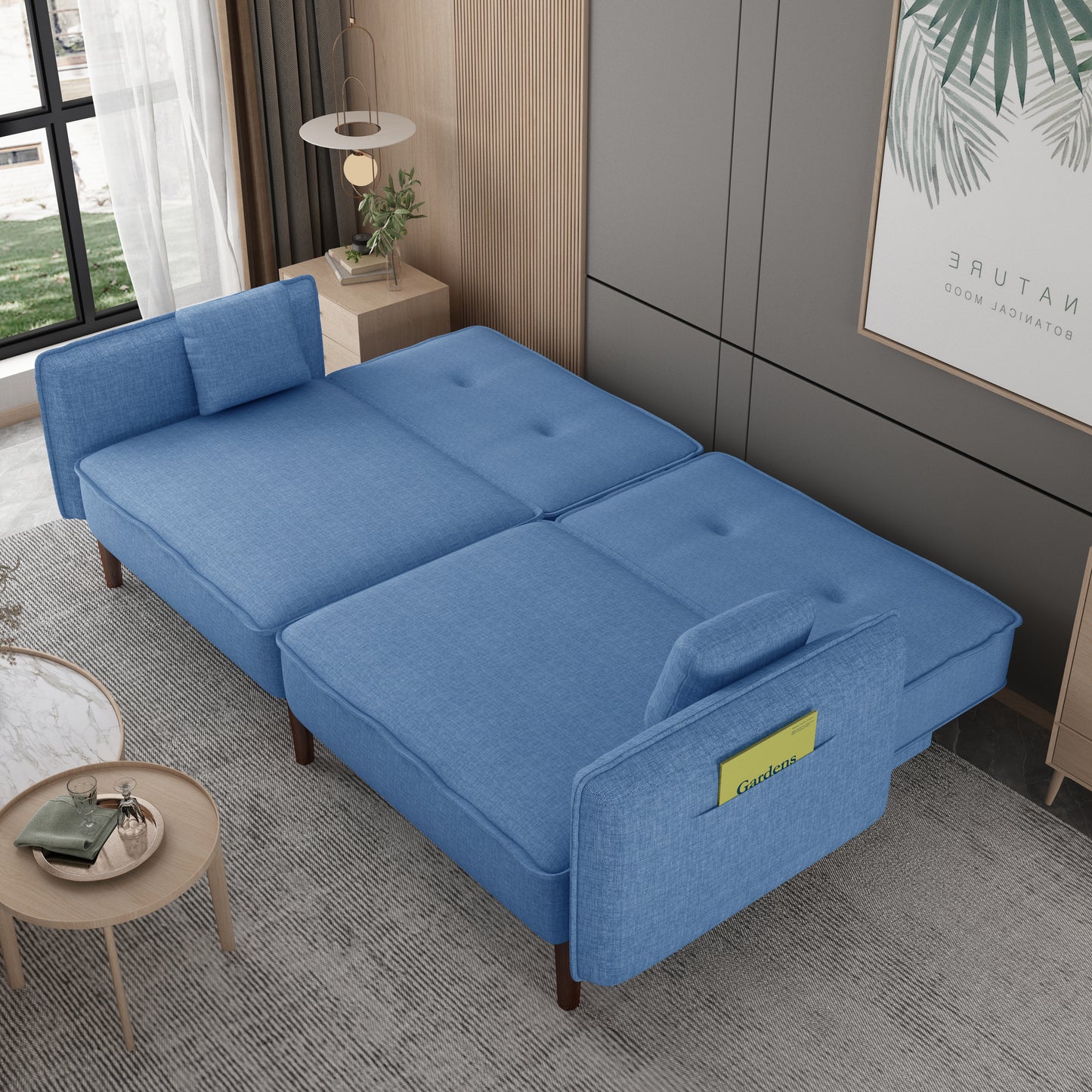 Sofá cama tipo futón para sala de estar en tela azul con patas de madera maciza, perfecto para espacios pequeños